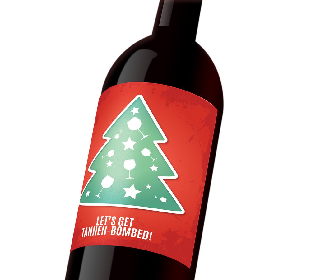 A red holiday custom wine label with a green tree decorated with stars and wine glasses. The label reads, 