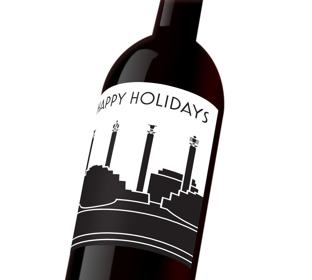 A black and white holiday custom label with Kansas City's skyline that reads, 
