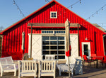 Our Vineyard Red Barn Tasting Room is located inside our big red barn. It includes an outdoor patio.