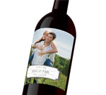 A customizable wine label depicting a couple together. The label reads, "Anna & Paul Happily Ever After"